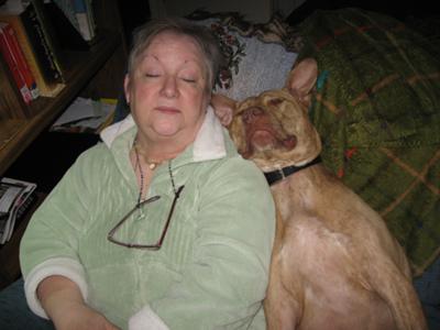 Peanut and Mommie sleeping in the recliner.