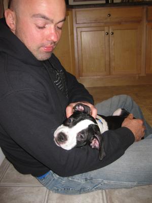 Lennon with my husband shortly after we adopted him